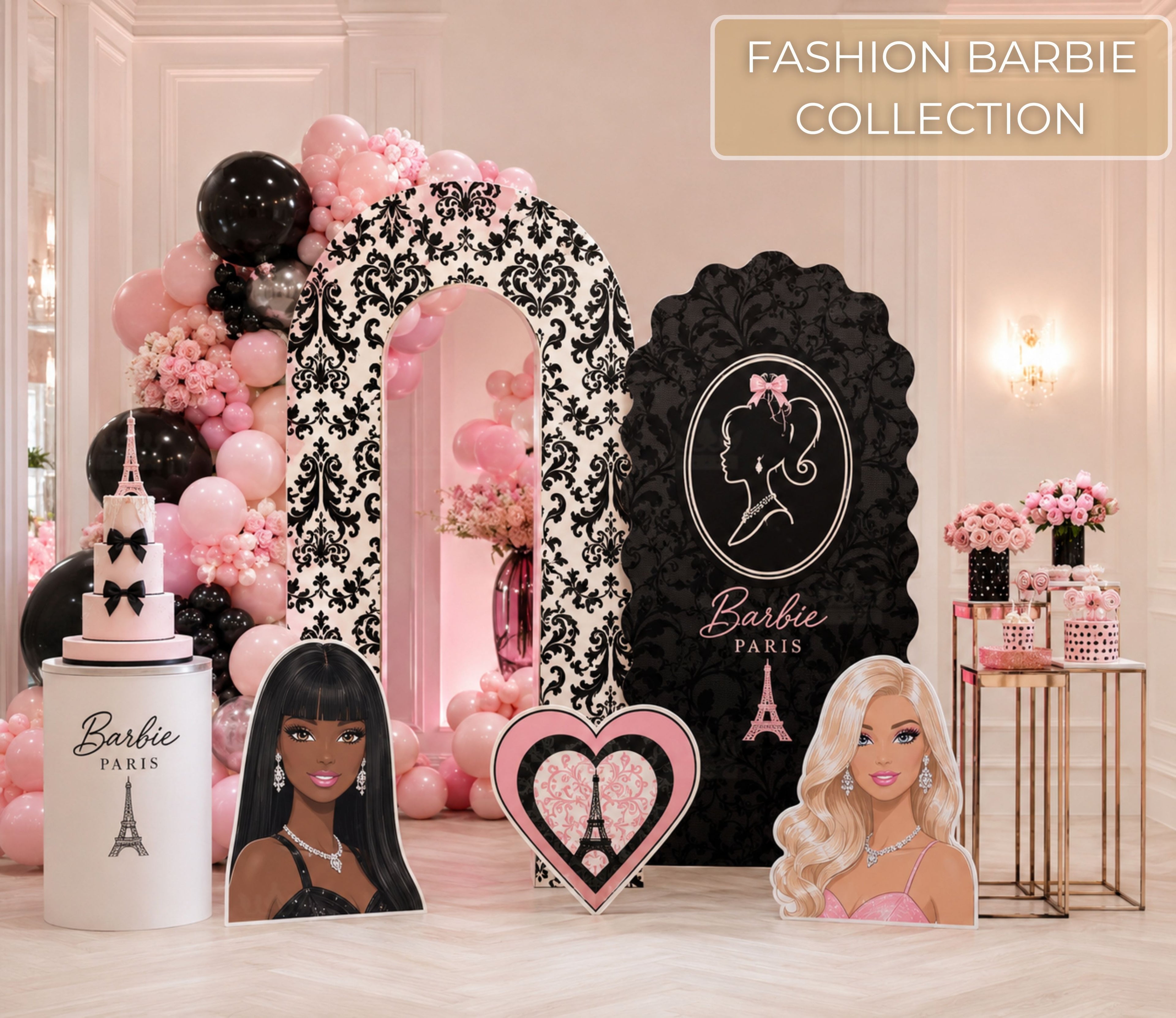 Personalized pink fashion doll birthday backdrop with black and hot pink balloon garland, glam vanity details and matching doll cutouts for a girls party.