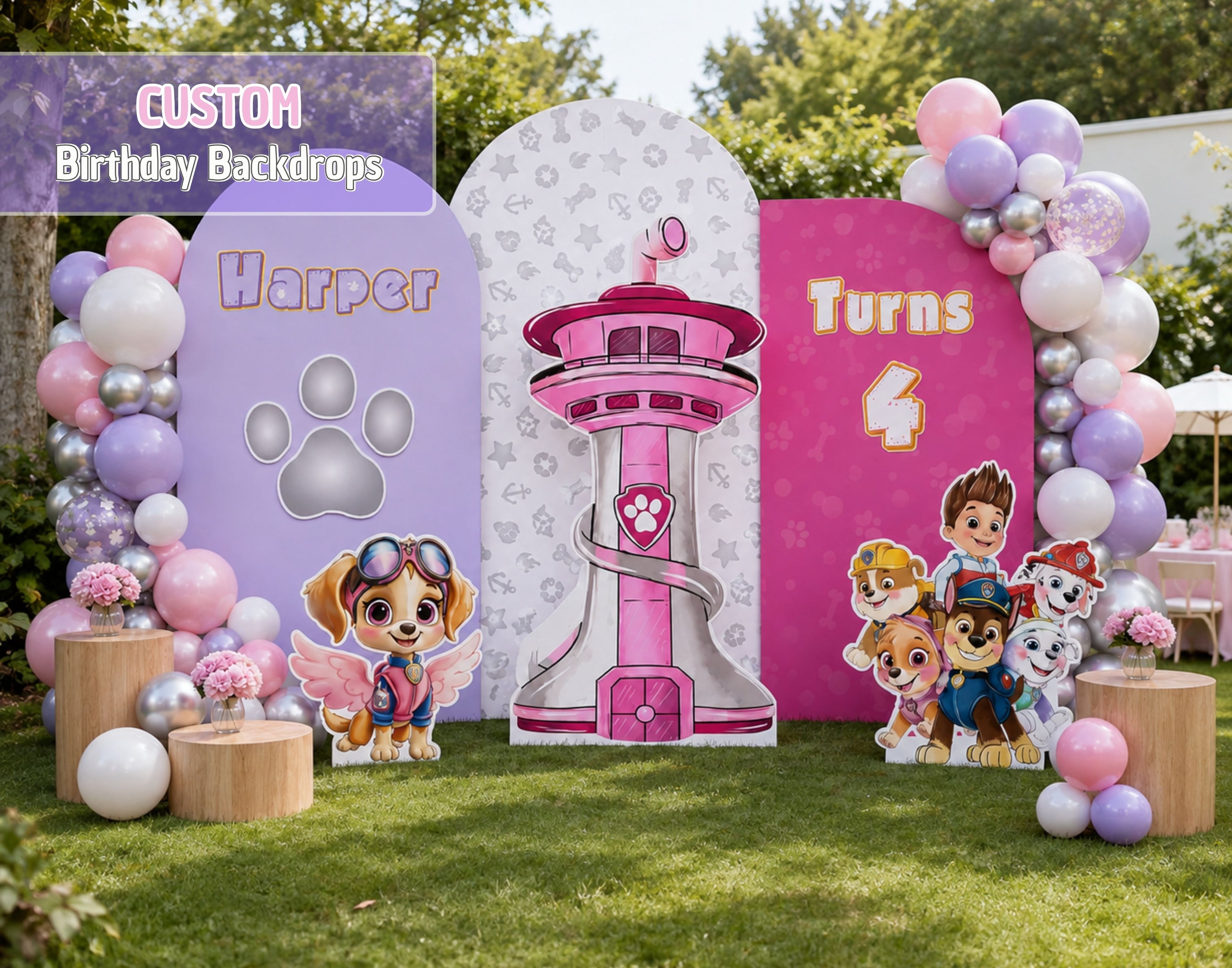 Outdoor pink puppy birthday setup with custom backdrop panels, balloon garland and character cutouts for a personalized celebration.