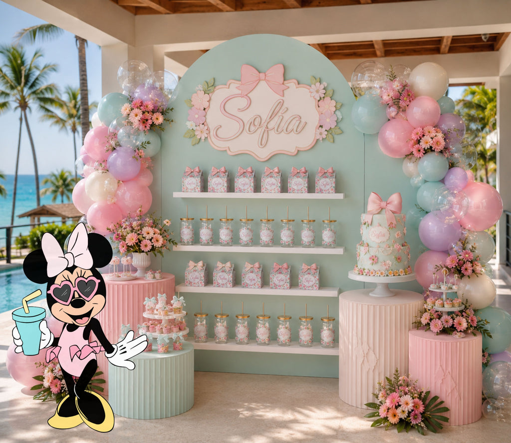 Personalized pastel pool party backdrop with favor display shelves, pink and aqua balloons, floral decor and character cutout for a girls birthday party.