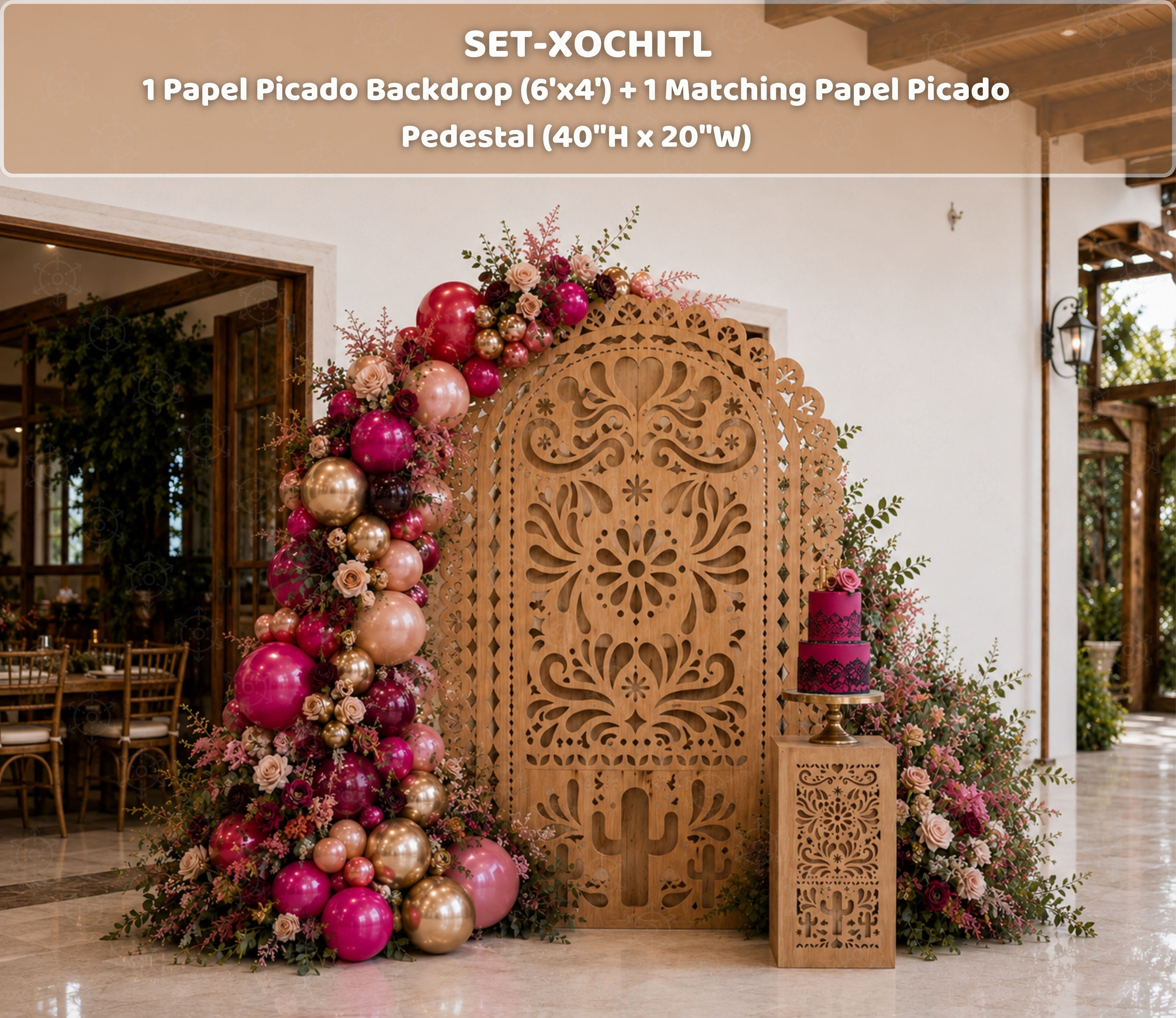 Terracotta Papel Picado backdrop with coordinating pedestals and burgundy floral decorations