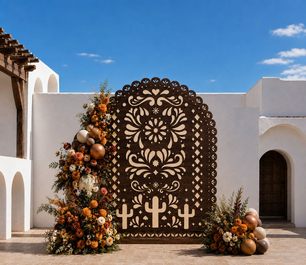 Dark brown printed papel picado backdrop with warm neutral balloon decor for rustic Mexican celebration