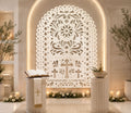White religious papel picado backdrop with cross design for elegant Christian celebration decor