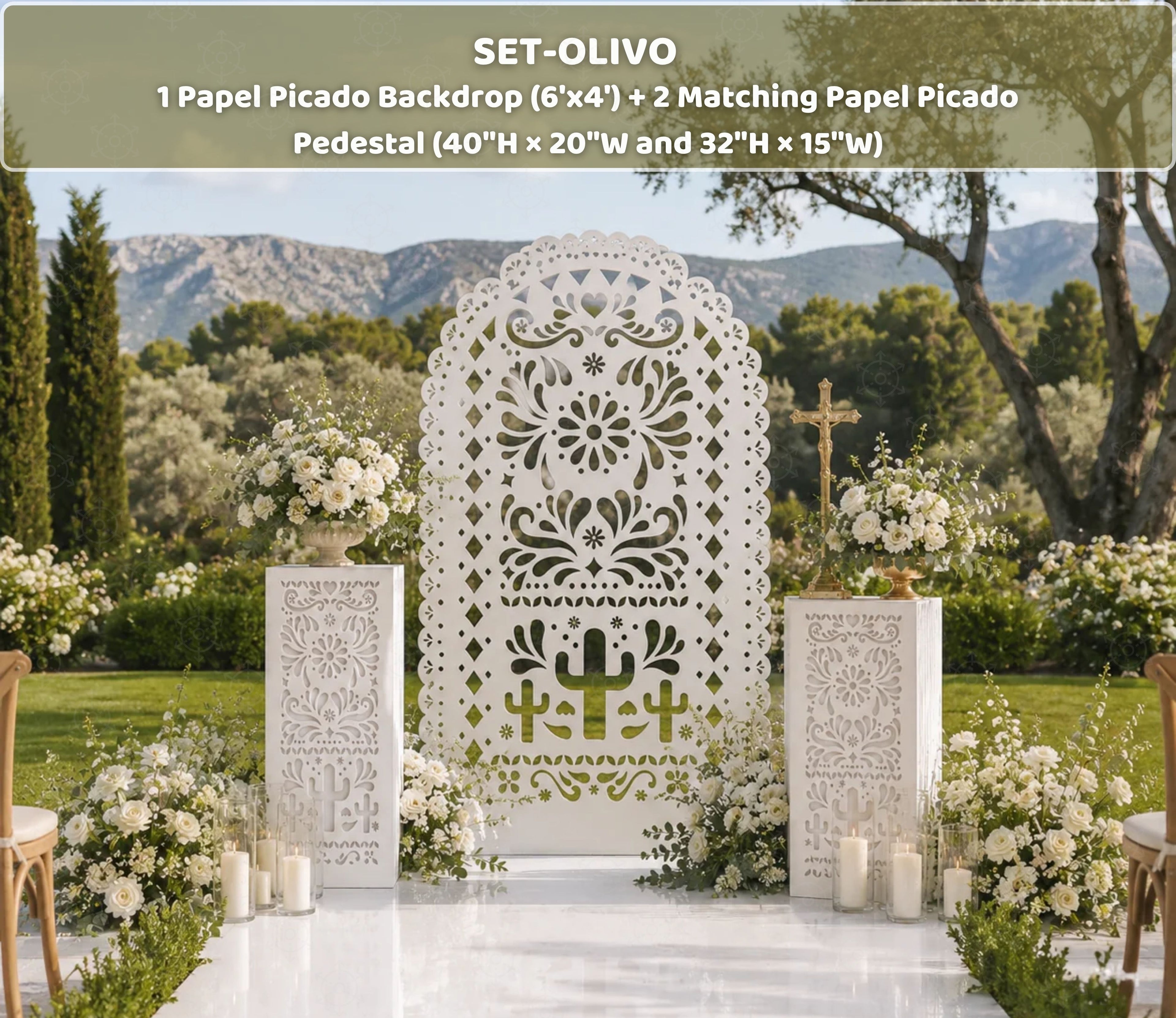White Papel Picado backdrop and pedestal set styled for an elegant outdoor Mexican celebration