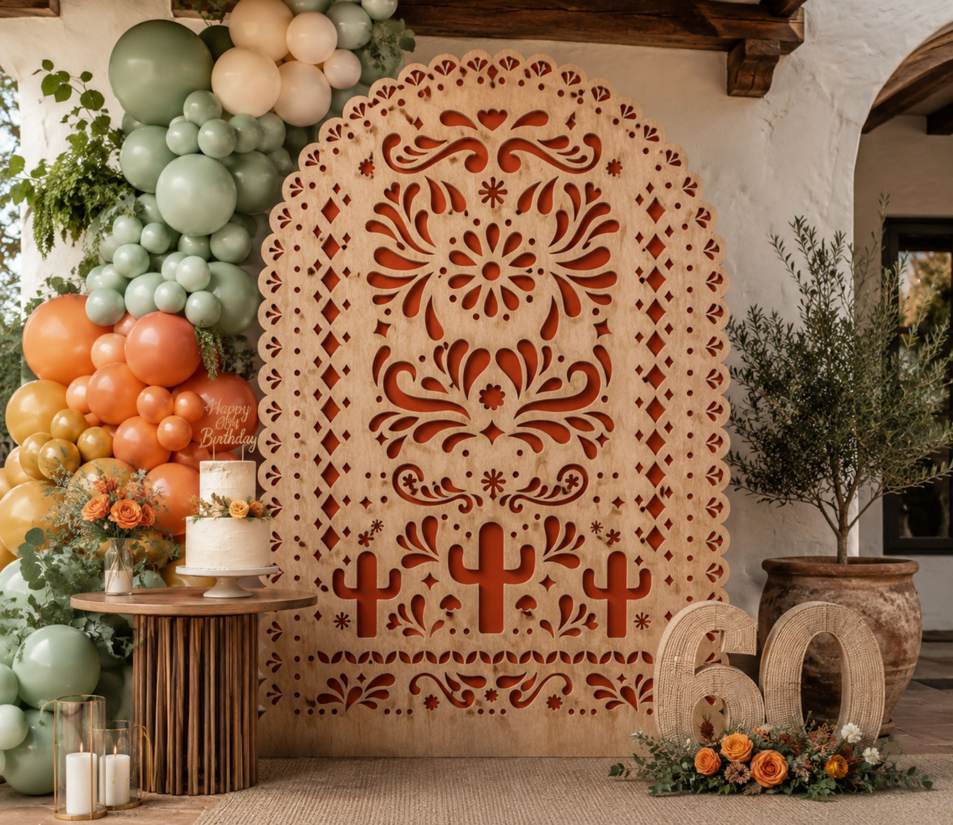 Terracotta printed papel picado backdrop panel styled for an elegant Mexican wedding celebration