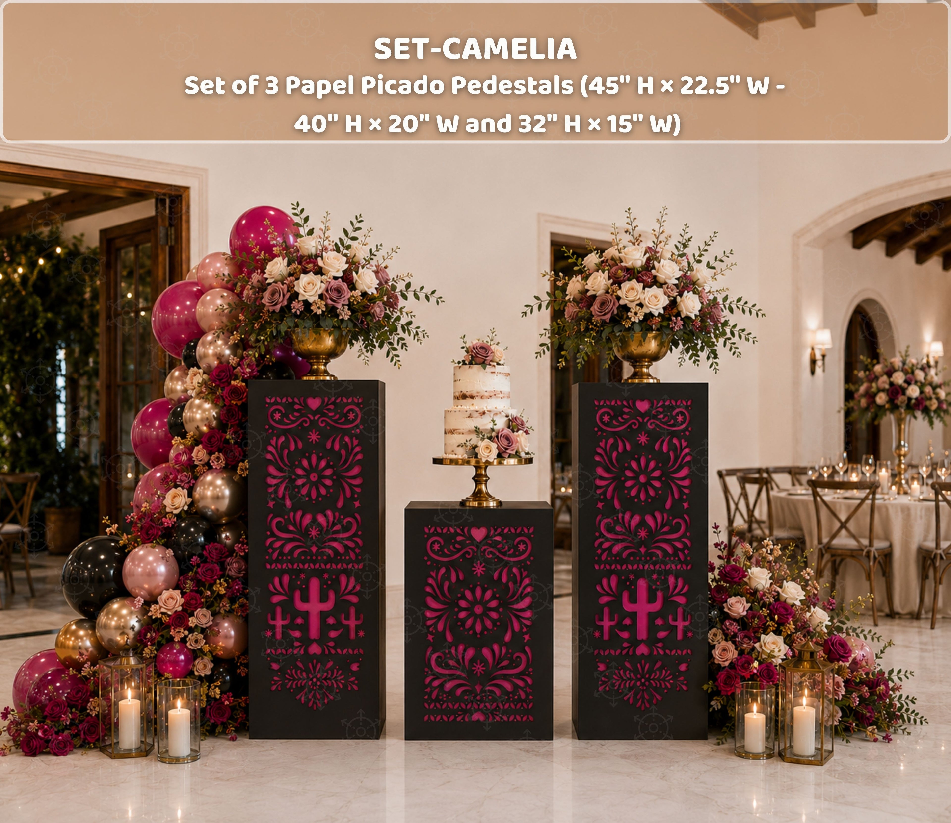 Black and burgundy Papel Picado pedestal set styled with floral decorations for an elegant event