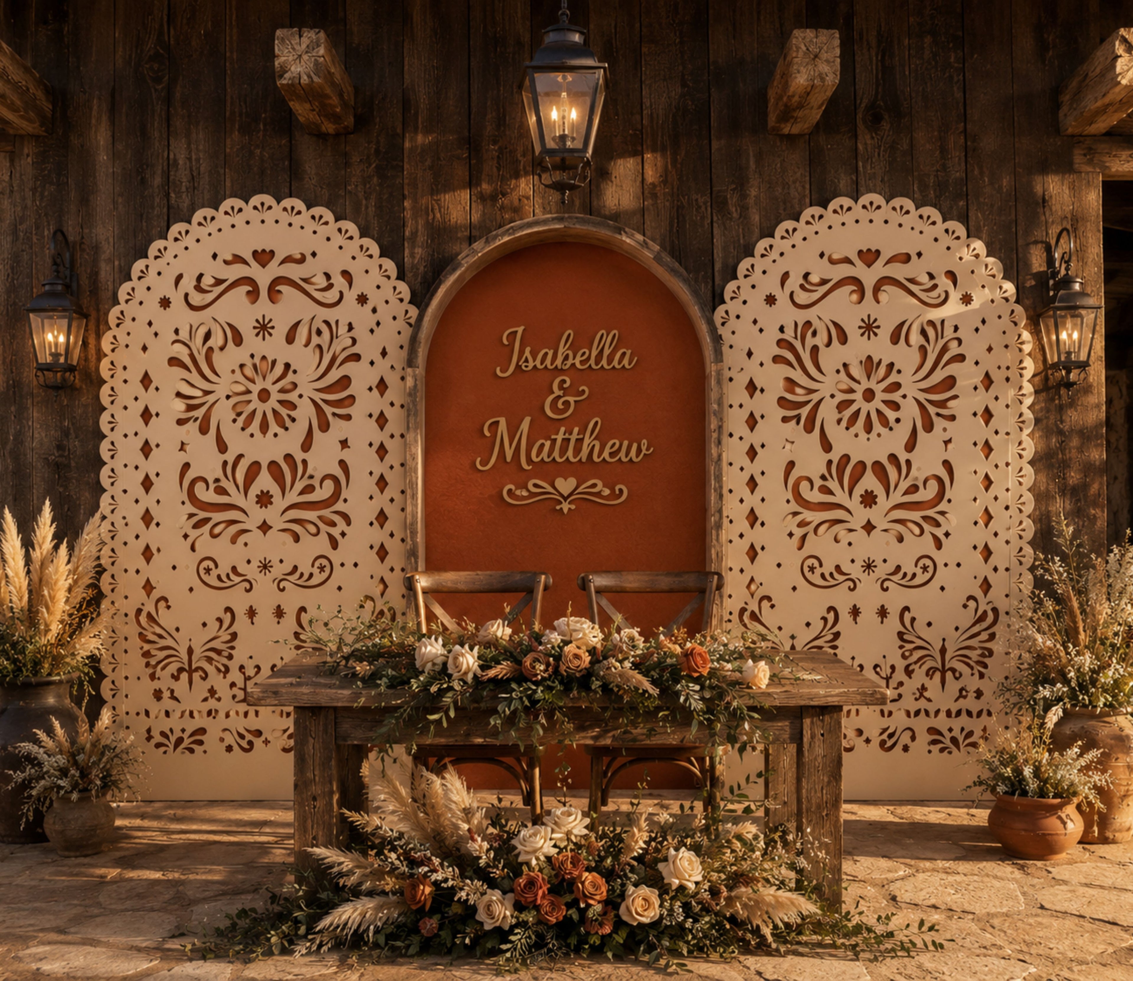 Three printed papel picado backdrop panels styled for a rustic Mexican wedding reception